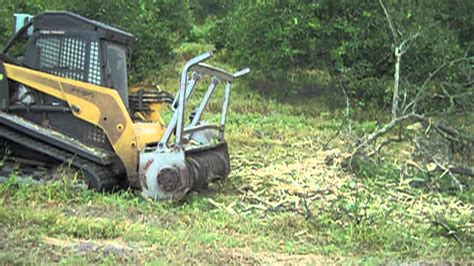 clearing cedar with skid steer|skid steer clearance.